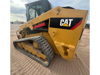 Мини-погрузчик с бортовым поворотом CATERPILLAR