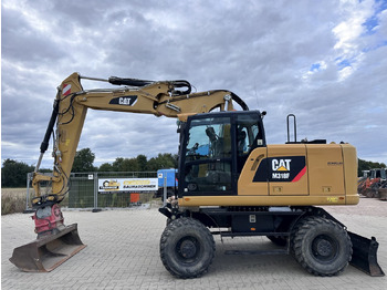 Колёсный экскаватор CATERPILLAR M318F