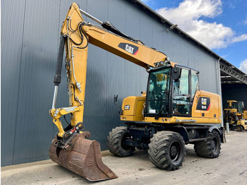 Колёсный экскаватор CATERPILLAR M318F