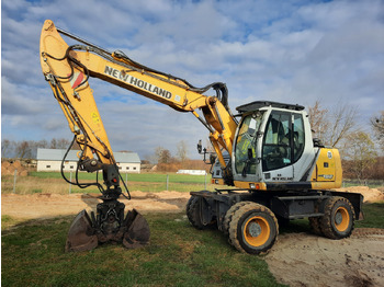 Колёсный экскаватор NEW HOLLAND