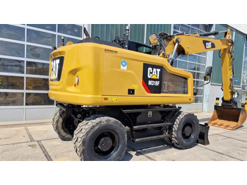 Колёсный экскаватор CATERPILLAR M318F