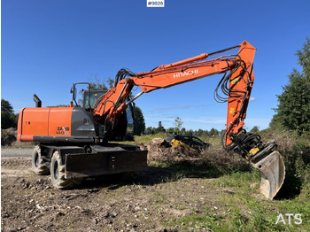 Колёсный экскаватор HITACHI ZX140W-5