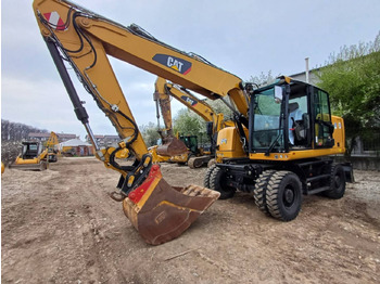 Колёсный экскаватор CATERPILLAR M318F