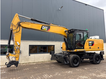 Колёсный экскаватор CATERPILLAR M322