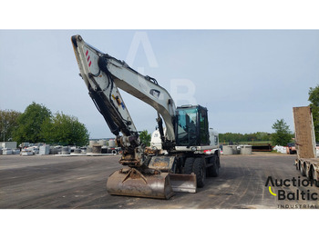 Колёсный экскаватор CATERPILLAR M322D