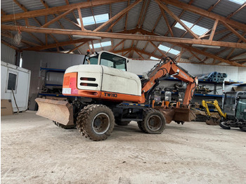 Колёсный экскаватор TEREX