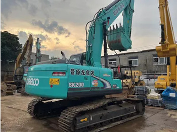 Гусеничный экскаватор KOBELCO