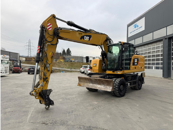 Колёсный экскаватор CATERPILLAR M320F