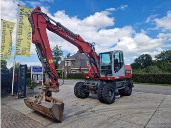 Колёсный экскаватор TEREX