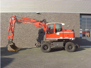 Колёсный экскаватор TEREX