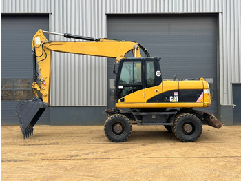 Колёсный экскаватор CATERPILLAR M315D