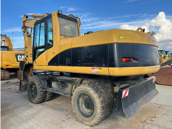 Экскаватор CATERPILLAR M318