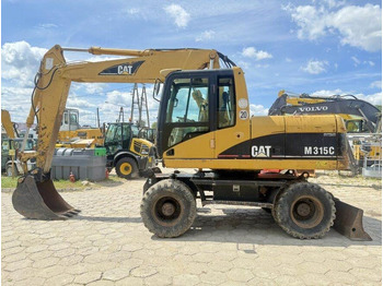 Колёсный экскаватор CATERPILLAR M315C