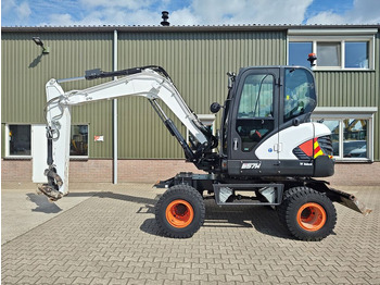 Колёсный экскаватор BOBCAT E57W