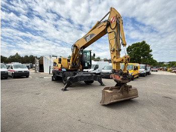 Колёсный экскаватор CATERPILLAR M322C