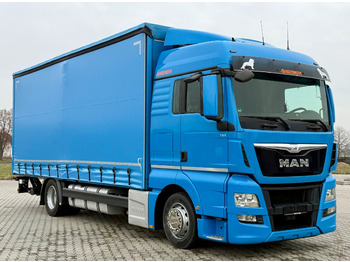 Тентованный грузовик MAN TGX 18.360