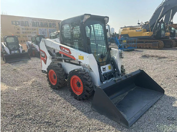 Мини-погрузчик с бортовым поворотом Bobcat S510: фото 5