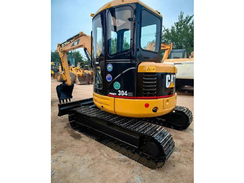 Мини-экскаватор CATERPILLAR