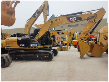 Гусеничный экскаватор CATERPILLAR
