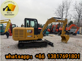 Мини-экскаватор CATERPILLAR