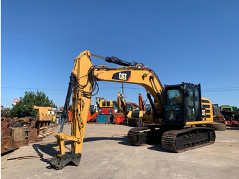 Гусеничный экскаватор CATERPILLAR 318