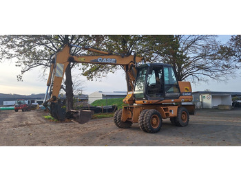 Колёсный экскаватор CASE