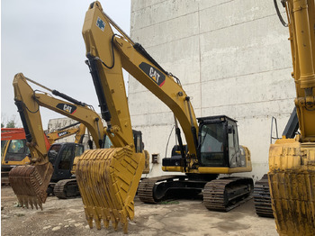 Колёсный экскаватор CATERPILLAR 323D2L