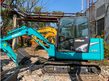 Гусеничный экскаватор KOBELCO