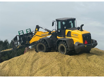Колёсный погрузчик NEW HOLLAND