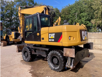 Колёсный экскаватор CAT M 316 D: фото 3