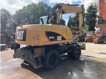 Колёсный экскаватор CAT M 316 D: фото 5