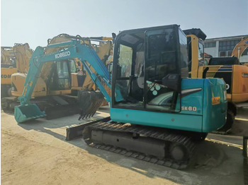 Гусеничный экскаватор KOBELCO
