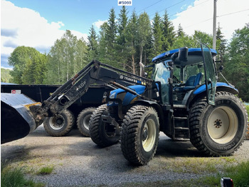 2009 New Holland T6040 SS w/ Trima front loader в лизинг 2009 New Holland T6040 SS w/ Trima front loader: фото 1
