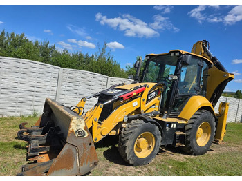 Экскаватор-погрузчик CATERPILLAR