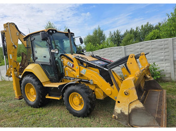Экскаватор-погрузчик CATERPILLAR