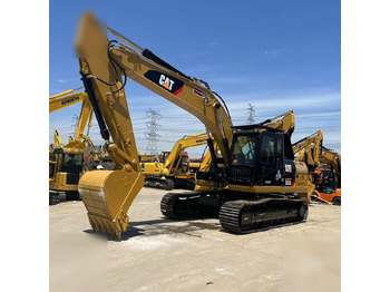 Гусеничный экскаватор CATERPILLAR 323DL