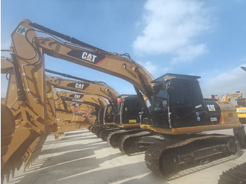 Гусеничный экскаватор CATERPILLAR