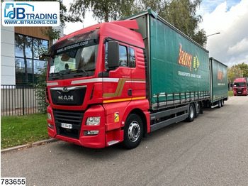 Тентованный грузовик MAN TGX 26.460