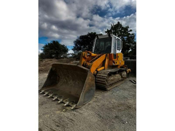 Гусеничный погрузчик KOMATSU
