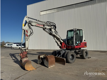 Колёсный экскаватор TAKEUCHI