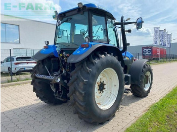 Трактор New Holland tm 155: фото 4