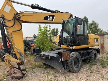 Колёсный экскаватор CATERPILLAR M322D