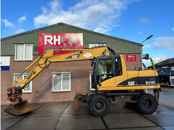 Колёсный экскаватор CATERPILLAR M315C
