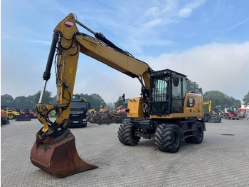 Колёсный экскаватор CATERPILLAR M320F