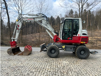 Колёсный экскаватор TAKEUCHI