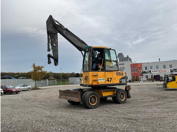 Колёсный экскаватор VOLVO EW140C