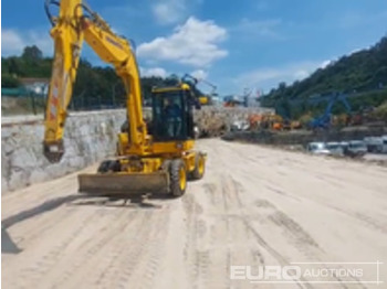 Колёсный экскаватор KOMATSU