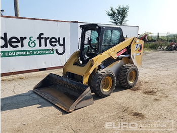 Мини-погрузчик с бортовым поворотом CATERPILLAR