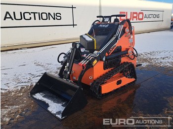 Мини-погрузчик с бортовым поворотом