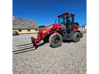 Мини-погрузчик с бортовым поворотом